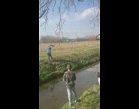 Boy blue jacket swing fall on water