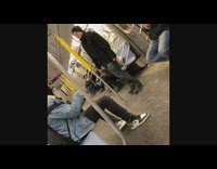 two men fighting on train guy in beanie standing