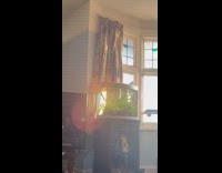 Sunlight hit fish tank make rainbow light