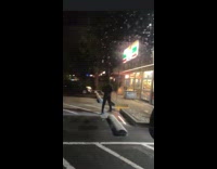 Guy walks towards the convenience store behind girl 