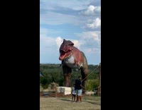 T-Rex Dinosaur large replica at a park