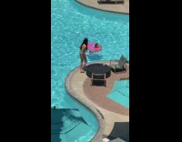 Girl bikini long hair selfie stick pool