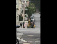 Girl poses yellow forklift construction vehicle street