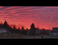 Beautiful orange wavy patten clouds sunset sky 