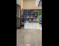 Woman curious about robot stock checker