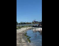 Girl blue top hang split hoop boat