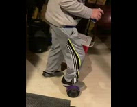 Guy holding beer can falls off hoverboard 