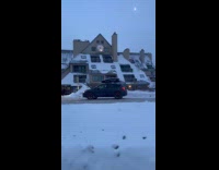 Three women in bikini poses outside snow