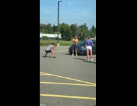 Shirtless guy cross arms black car front