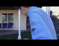 Boy does a backflip off wooden pillar and lands on back of head