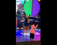 Kid spins around dance to Dancing Queen