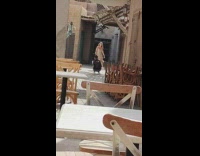 Lady Skips and Turns as Man Records Her