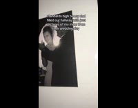 Parents wedding photos framed at hallway wall