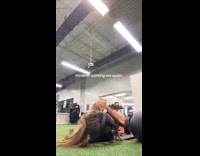 Collab ClipsIG - Woman using ab roller at gym and fails 
