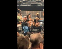 Couple Dances on Middle of Concert Walkway