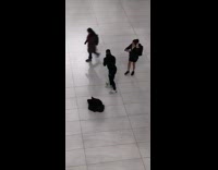 Guy with white green broom 