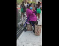 Lady sits blue walker sidewalk shaves eyebrow 