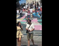 Collab IITW - Woman red beret walks down the stairs