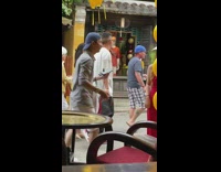 Woman red dress yellow lanterns