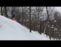 Little boy falls and does scorpion snowboard 