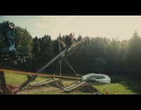 Guy gets launched by human slingshot pool