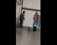Man Stretch with Pull Rope in Subway