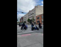 Group of guys hits motorcycle on road