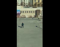 Guy headphones sweater rap rooftop deck