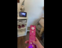 Cat on tower hits pink wii remote 