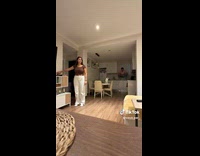 Couple switches light and makes weird pose