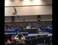 Girl swings on gymnastics bars hits head on bar