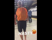 Guy walks in subway station with bare feet, nasty
