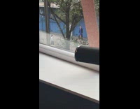 Girl wave black jacket blue dress street