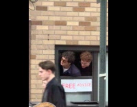 Two guys stick head out window free advice