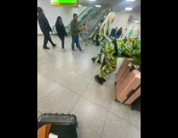 Man Pushes Multiple Luggage in One Go