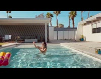 Woman bikini selfie video hair splash swimming pool