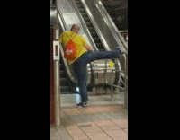 Guy stretches leg on bars at subway Part 2 
