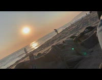 White shirt girl runs shore beach sunset 