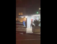 Strangers photo bomb video shoot outside store