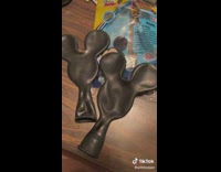 Two black mickey mouse shaped balloon doesnt look close 