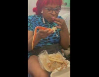 Woman eats crab legs in train 