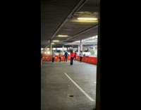Group Has Dance Workout in Parking Structure 