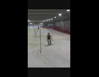 Guy slides off skis after course 