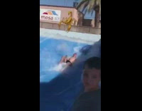 Guy blue boogie board wave simulator fail 