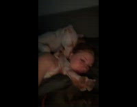 White dog stretches pushes owners head 