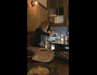 Blonde girl eating ring light for food 