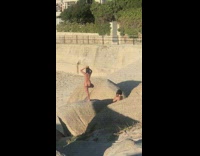 Woman yoga pose on rock picture