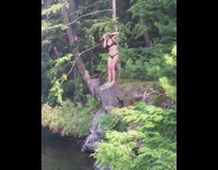 Girl shotguns beer then backflips into water
