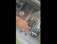 Girl baggy jacket leg pop take selfie