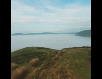 View of ocean water fog white sheep 